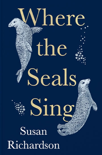 Dark blue book cover - 'Where the Seals Sing' in gold lettering and 'Susan Richardson' in white. Two seals swim on either side of the title.